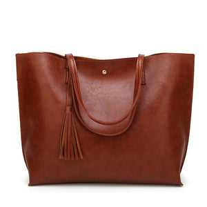 Modische Damen Tasche mit Quasten